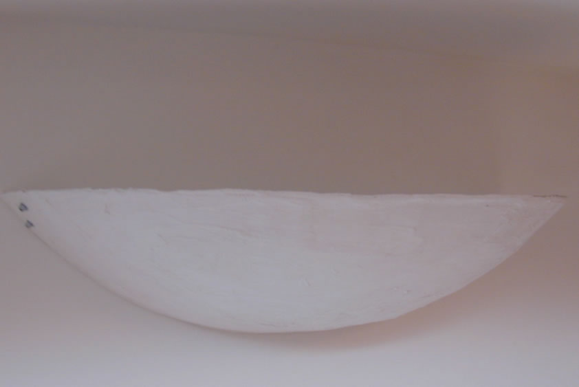 Beautiful natural plaster uplight and wall fixture.